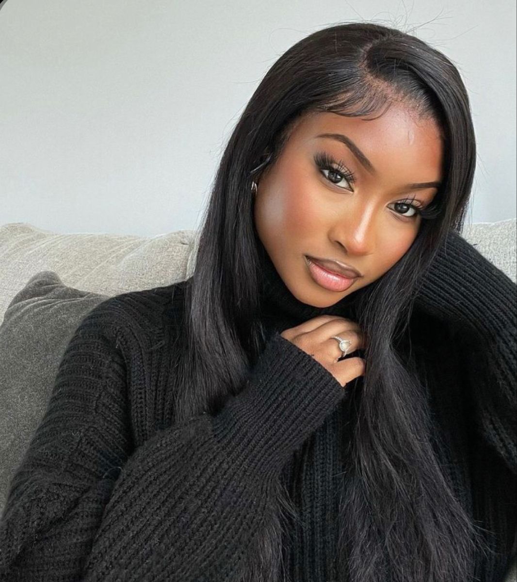 Woman wearing a sleek straight lace wig